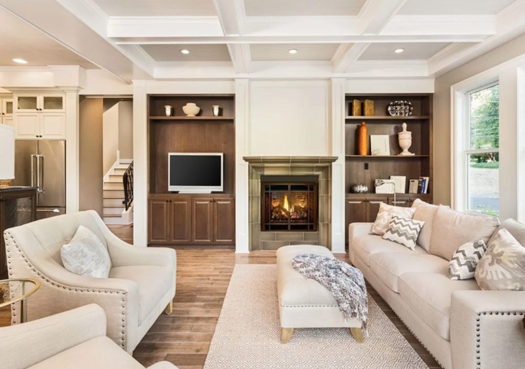 White and brown themed living room with fireplace - Newton MA Home Remodeling Exponential Construction Corp.